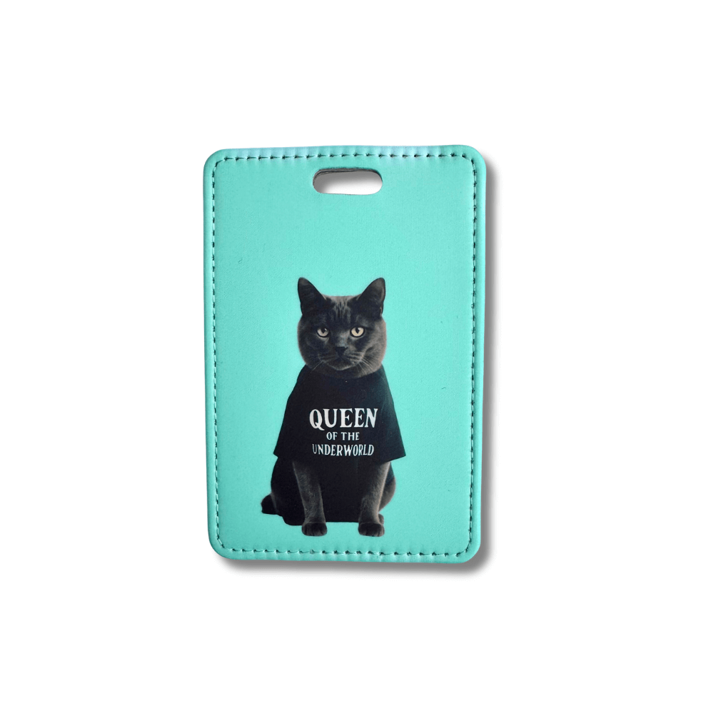 Attitude cat luggage tag with teal background featuring black cat in “Queen of the Underworld” shirt.