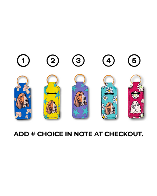 Five Basset Hound chapstick holders in assorted colorful patterns with gold keyrings – neoprene lip balm keychain gifts for dog lovers