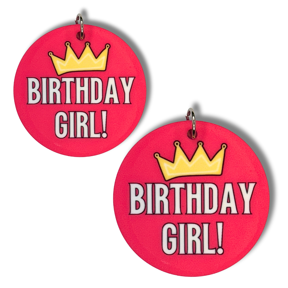 deep pink-red circles (two sizes, same design) of fun collar charms for dog birthday. WordS: BIRTHDAY GIRL! with gold crown about.
