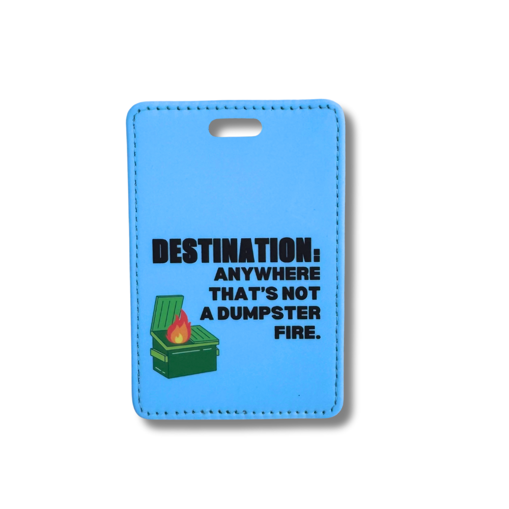 Blue faux leather luggage tag with a political humor design featuring a dumpster fire and the words "Destination: Anywhere that's not a dumpster fire."