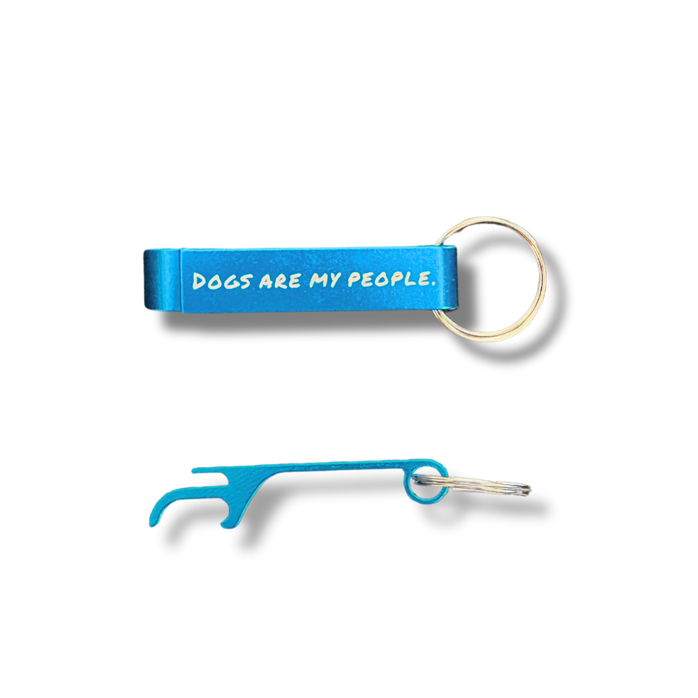Blue metal keychain with bottle opener attachment and “Dogs Are My People” text, shown on white background