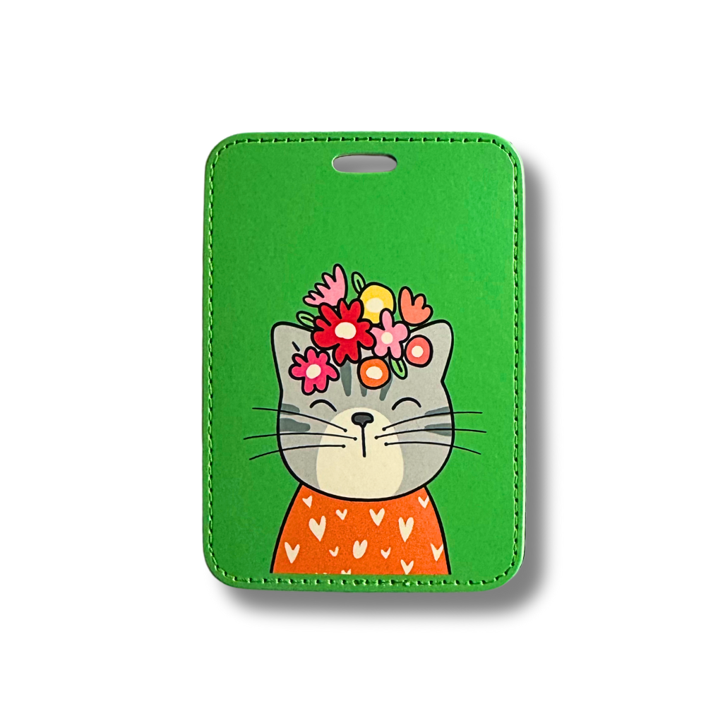 Cute cat luggage tag. Bright green background. Contemporary cat with flowers on head and wearing an orange shirt with modern hearts.