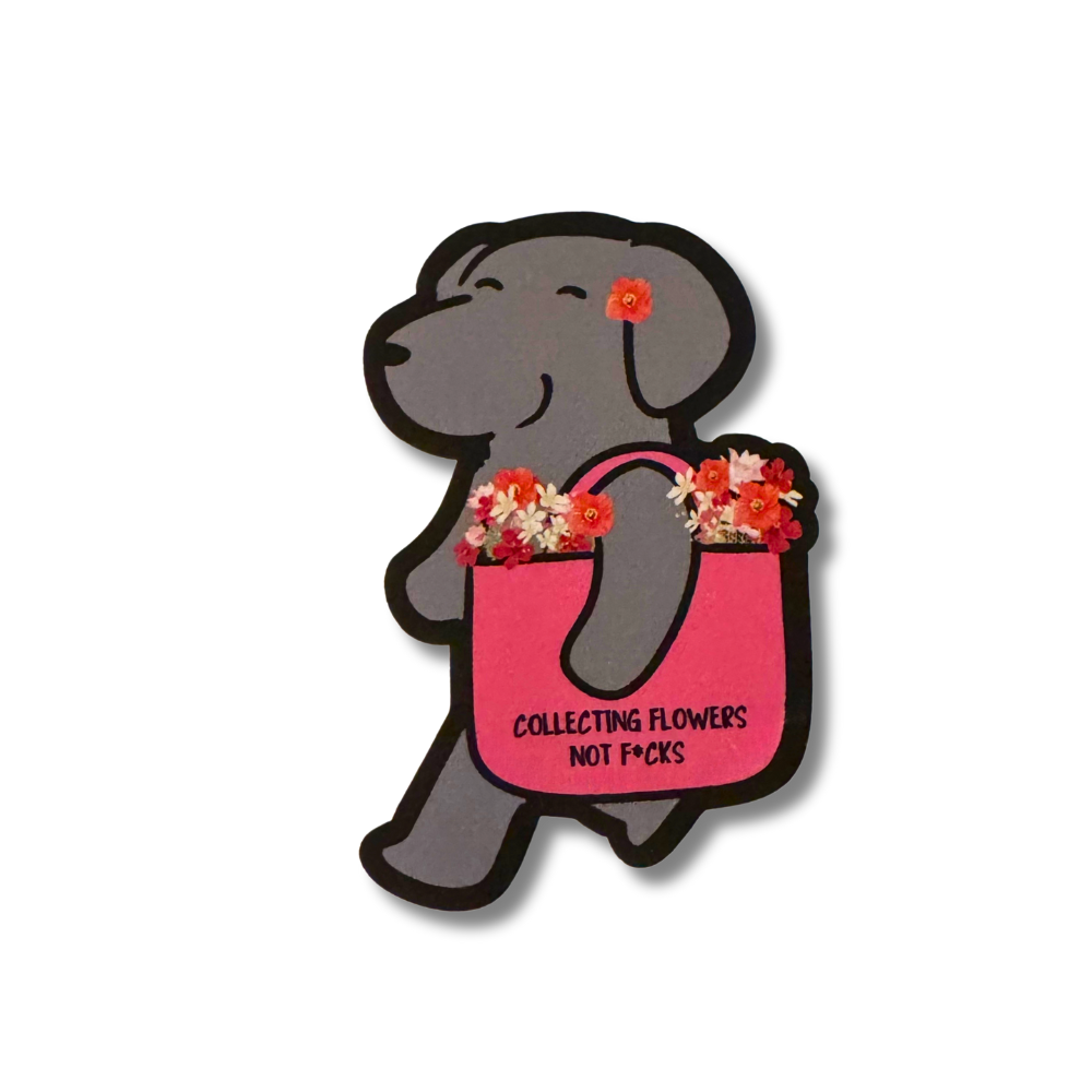 Gray cartoon dog sticker with flowers in a pink tote bag that says “Collecting Flowers Not F*cks.” Funny waterproof vinyl dog sticker.