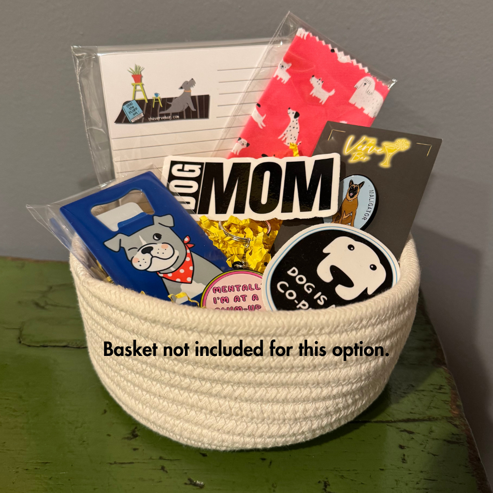 rope basket filled with dog lover gifts such as bottle opener, notepad, lens cloth, sticker, pin, and keychain