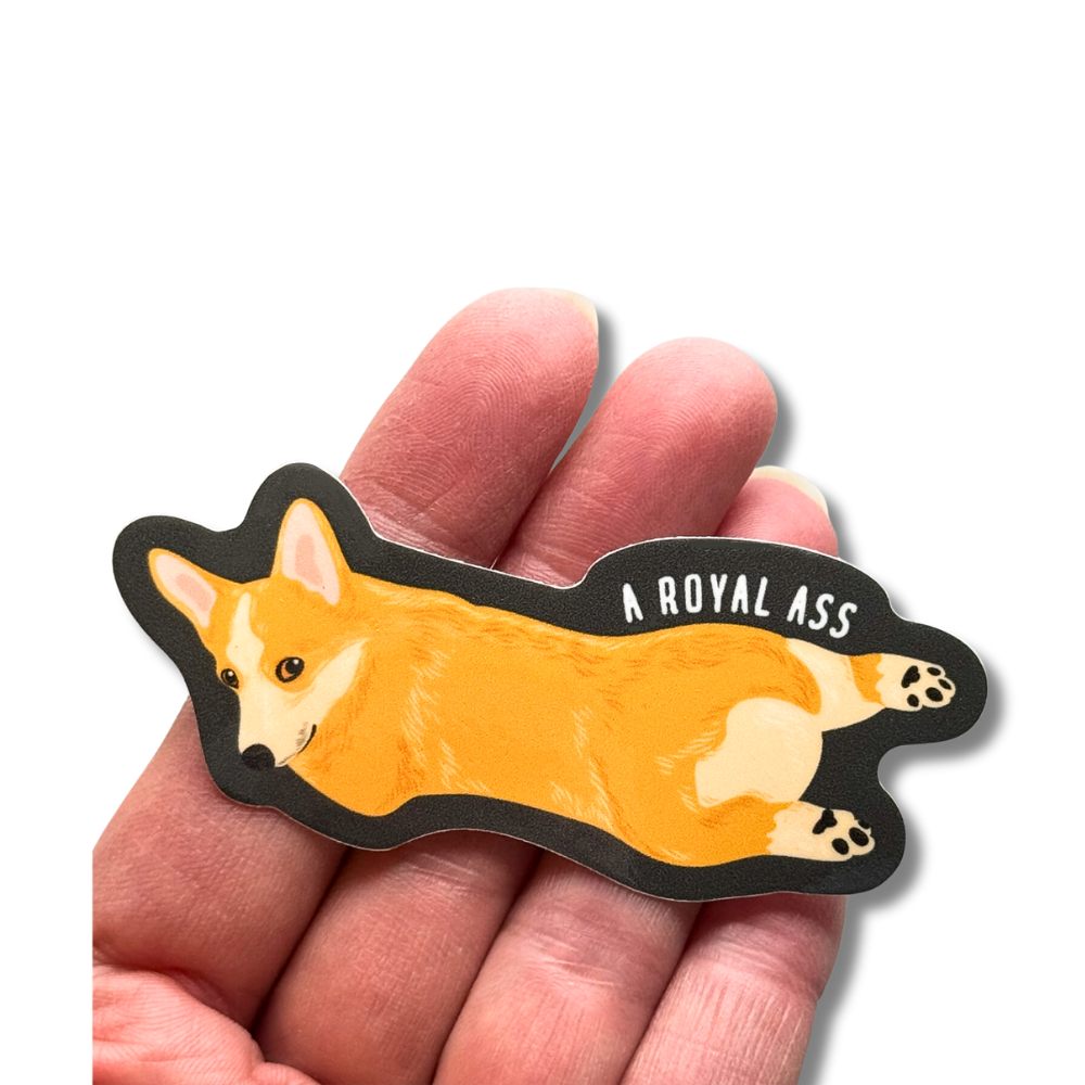 corgi decal in a hand to show size comparison