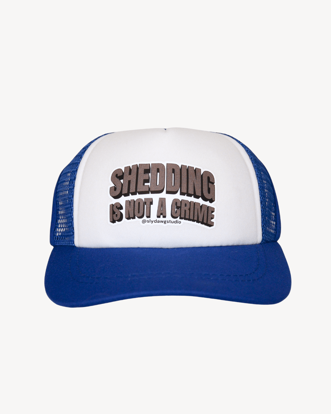 dog-trucker-hat-with-saying-shedding-is-not-a-crime-blue-sly-dawg-studio
