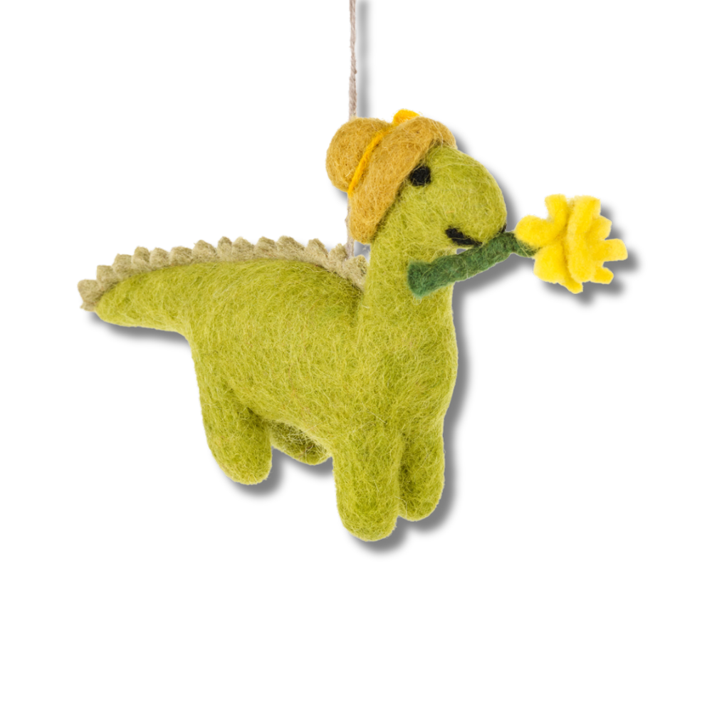 Cute green felt dinosaur ornament; green dino wearing a yellow hat The dino has a yellow flower in her mouth.