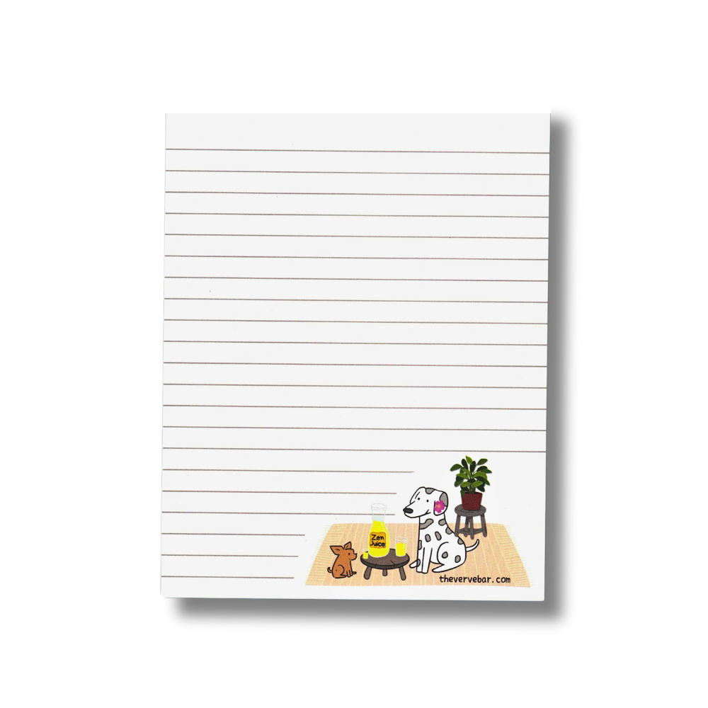 lined notepad with dalmatian and chihuau in bottom right corner. The dogs are sitting on a peach colored rug with a plant behind them. They are drinking juice with label: Zen Juice