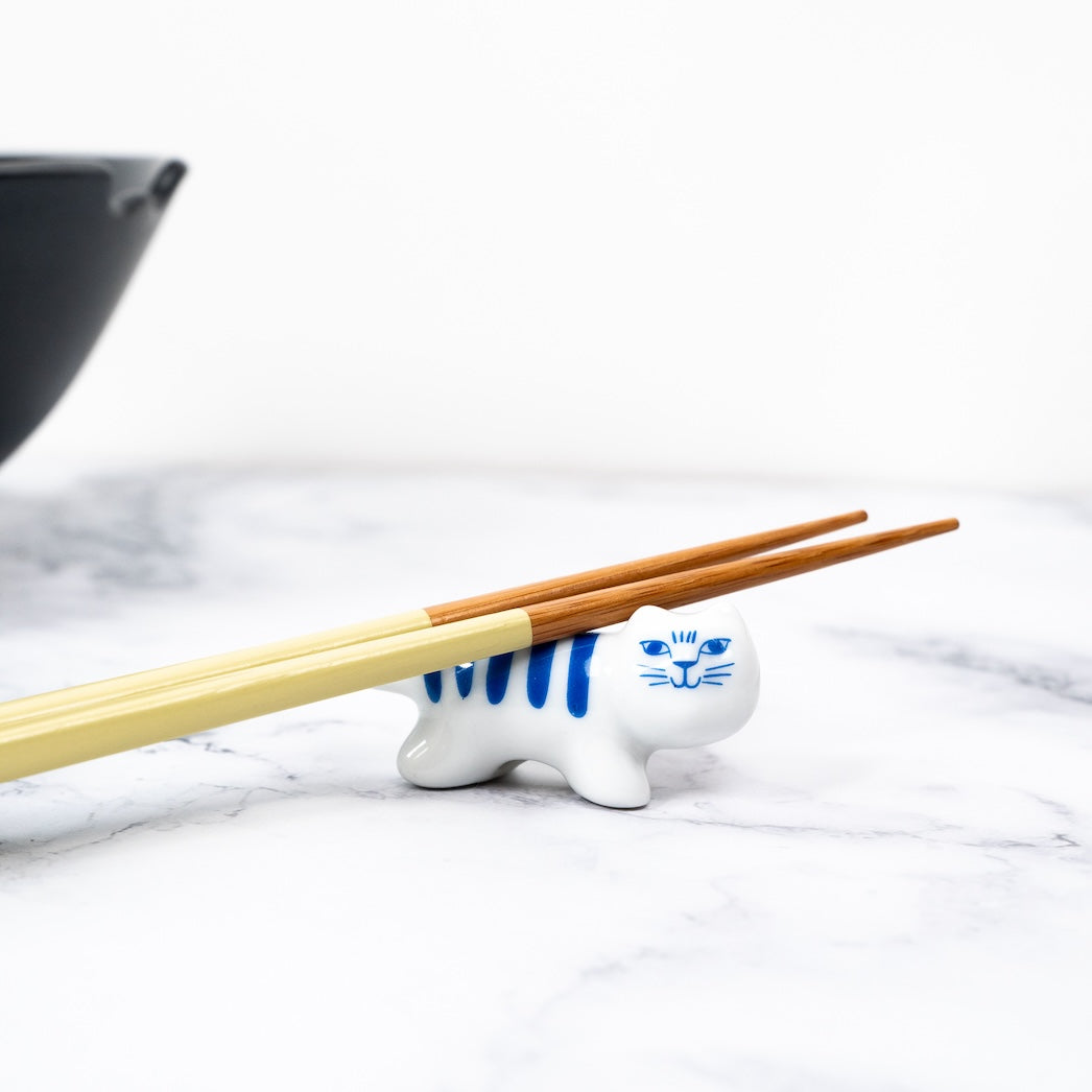 blue striped cat chopstick rest