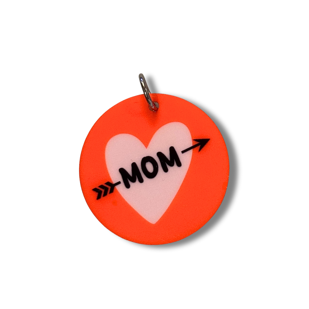 standard size dog mom pet collar charms. Red circles with lavender heart and "mom" with an arrow through it.