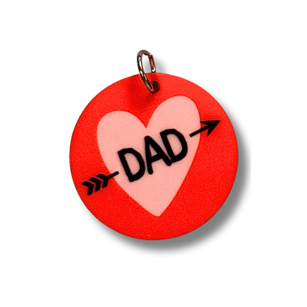 large breed pet collar charm for Valentine's day dog... round dark pink/red circle with lavender heart and black text "DAD" with arrow through it.