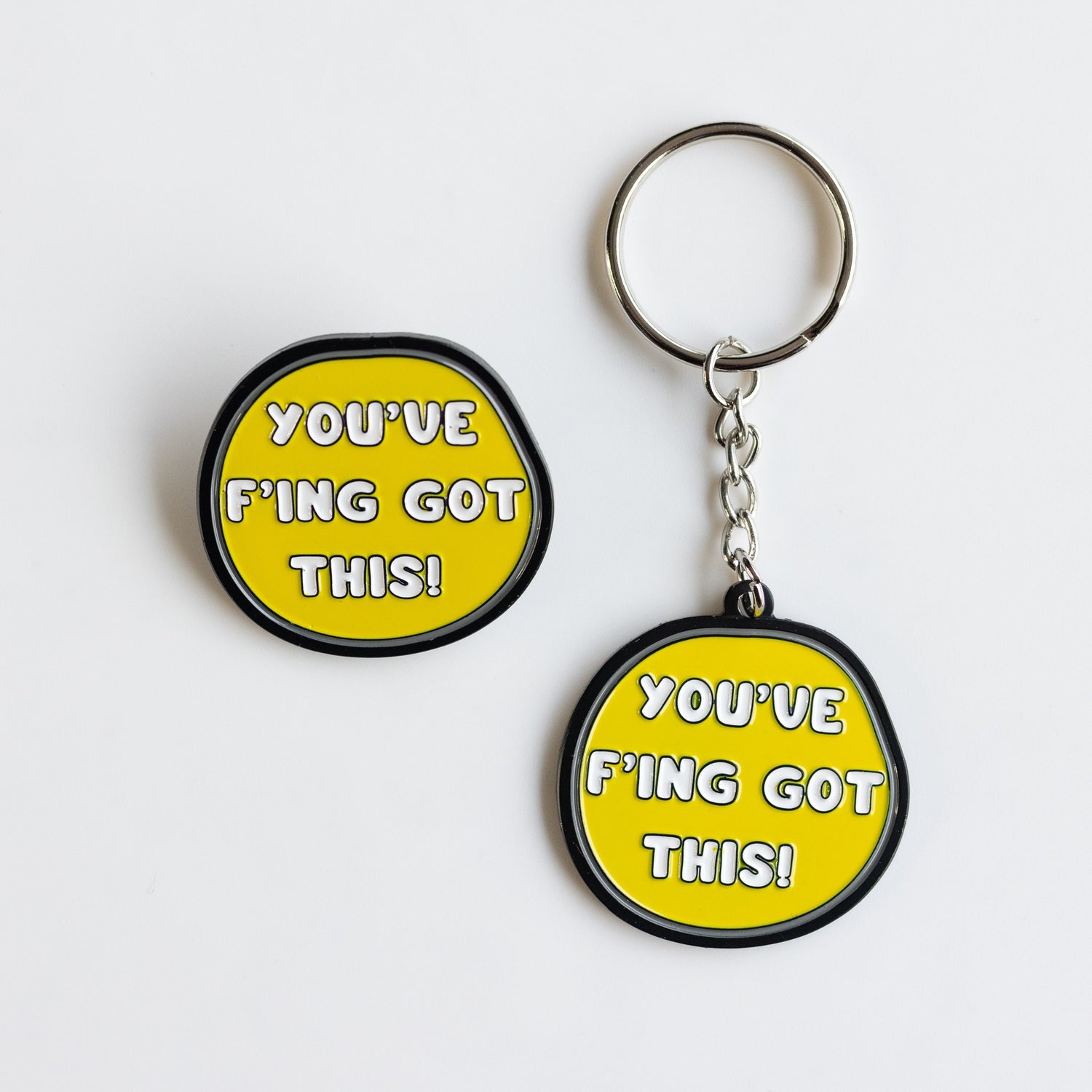 Yellow, white and black enamel pin and keychain, "You've f'ing got this!"