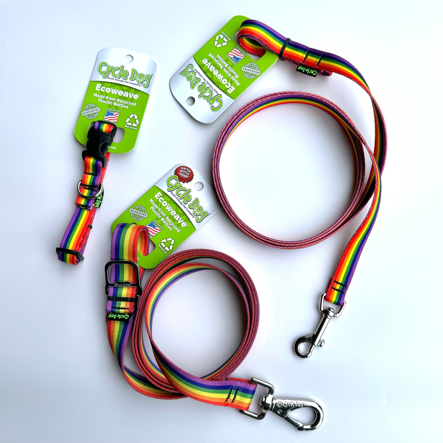 Rainbow dog collars and leashes displayed on a blank background. Get your pet geared up in style with these colorful accessories from The Verve Bar.