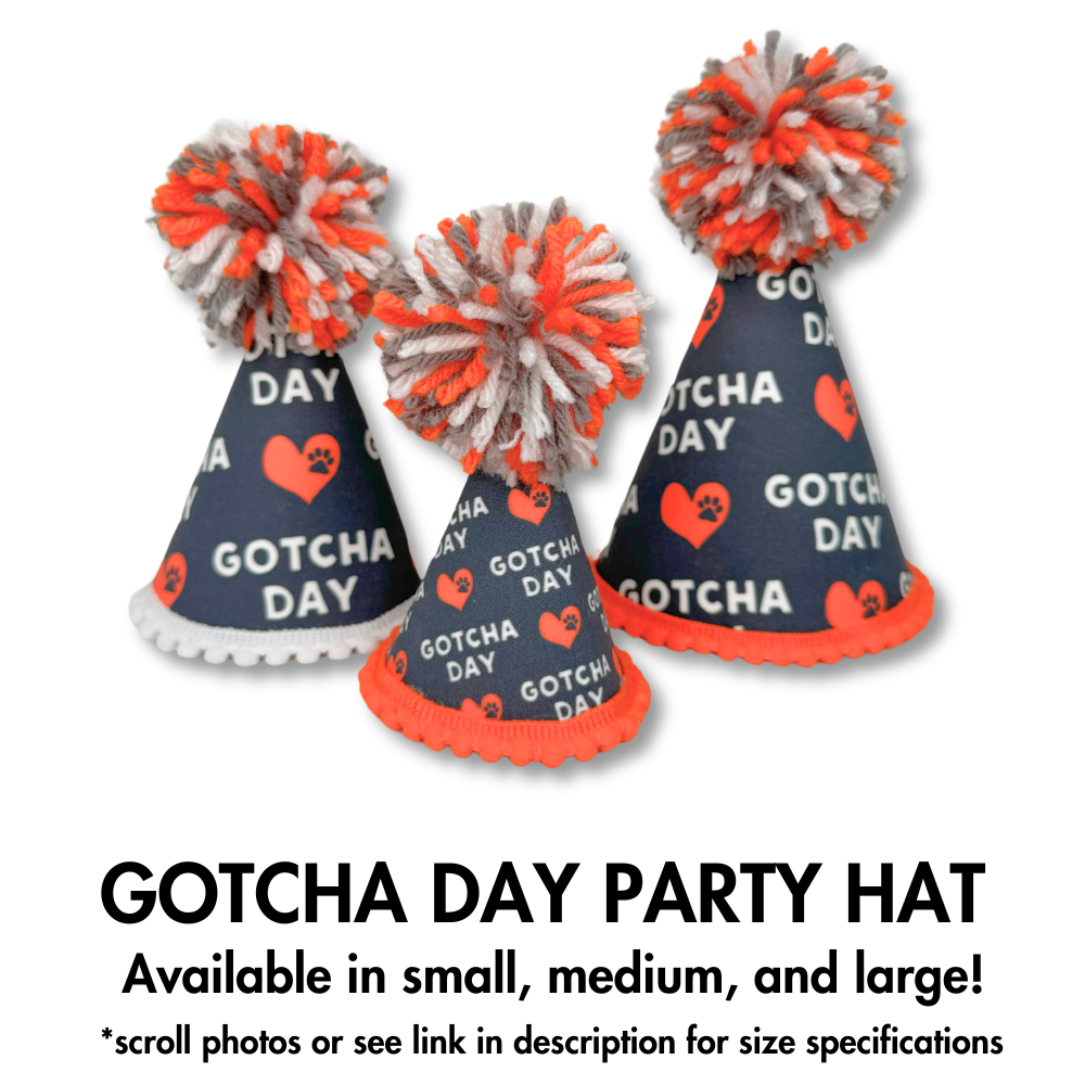 Dog Gotcha Day party hats in 3 sizes for all dog breeds. Gray, orange, and white with words "gotcha day," hearts, and large poms.