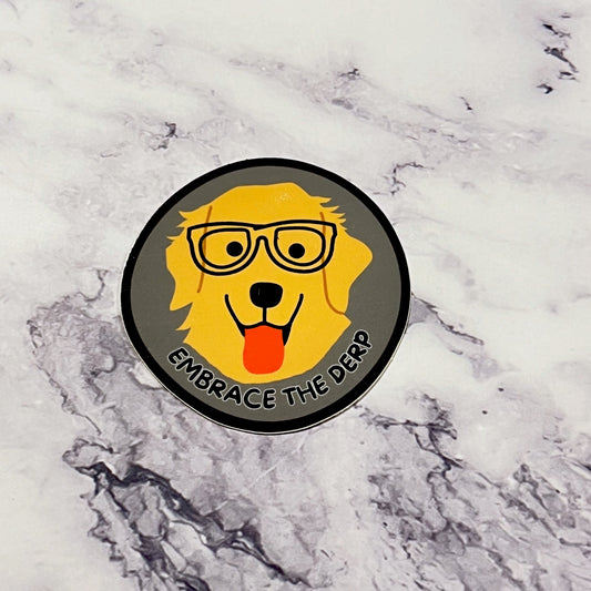 round cartoon image of smiling golden retriever dog wearing glasses "embrace the derp"