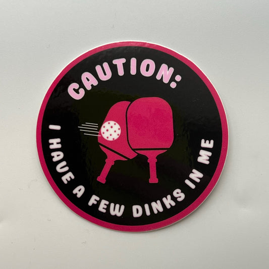 black and pink circle sticker ... Caution: I have a few dinks in me