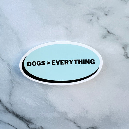 Light blue oval vinyl sticker: Dogs > Everything
