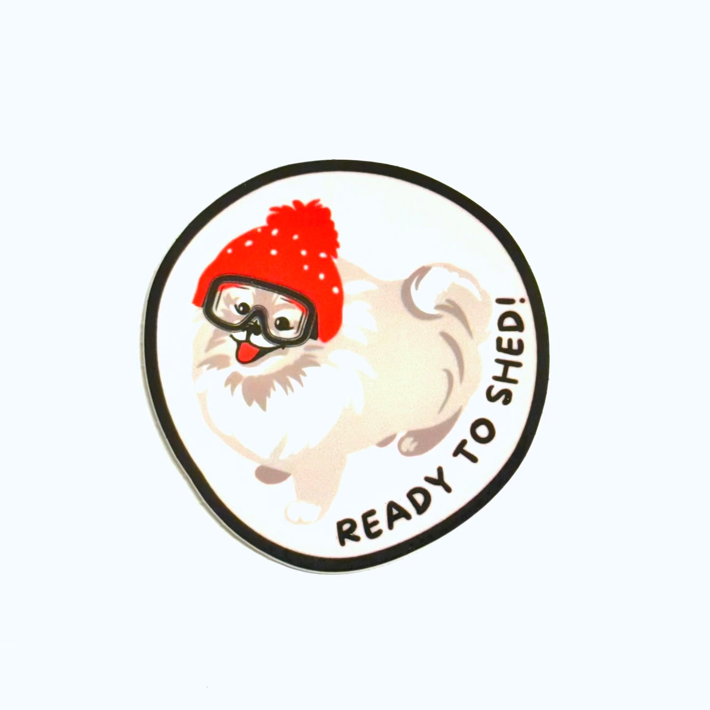 irregular circle shape .. pomeranian dog with stocking cap and goggles "Ready to SHED" vinyl dog sticker
