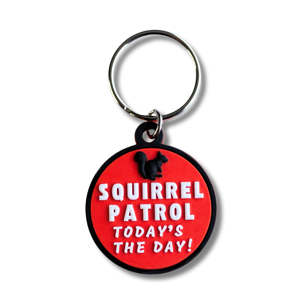 red and black flexible pvc materail with 3-D PRINT, circle shaped dog collar charm with black squirrel on the top and words "squirrel patrol, today's the day!"