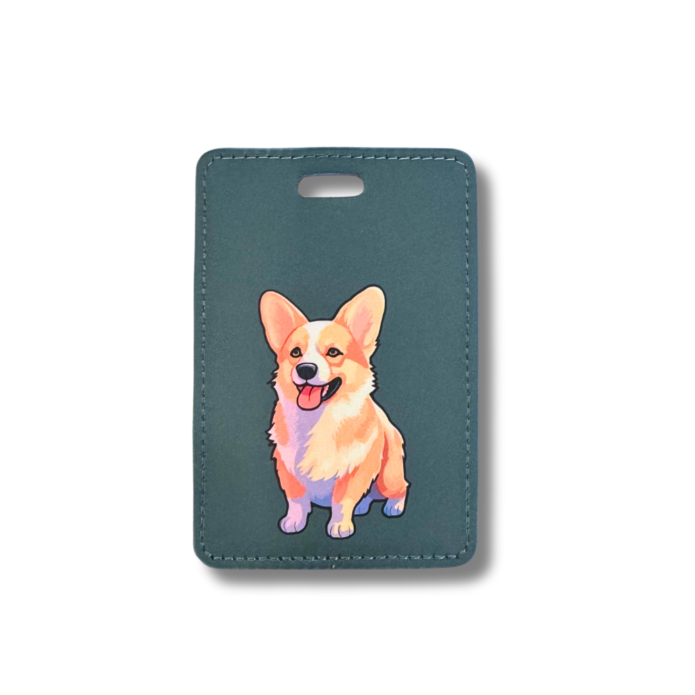 Faux leather corgi luggage tag for travel. Background is gray. Corgi is tan and white.