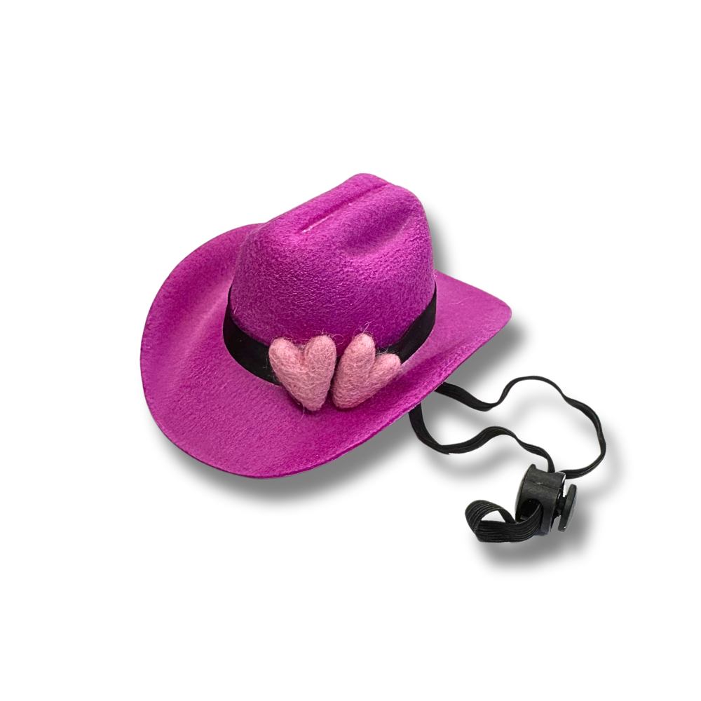 dog cowboy hat - purple with two lavender felt hearts and chin strap hanging to side to show mechanics.