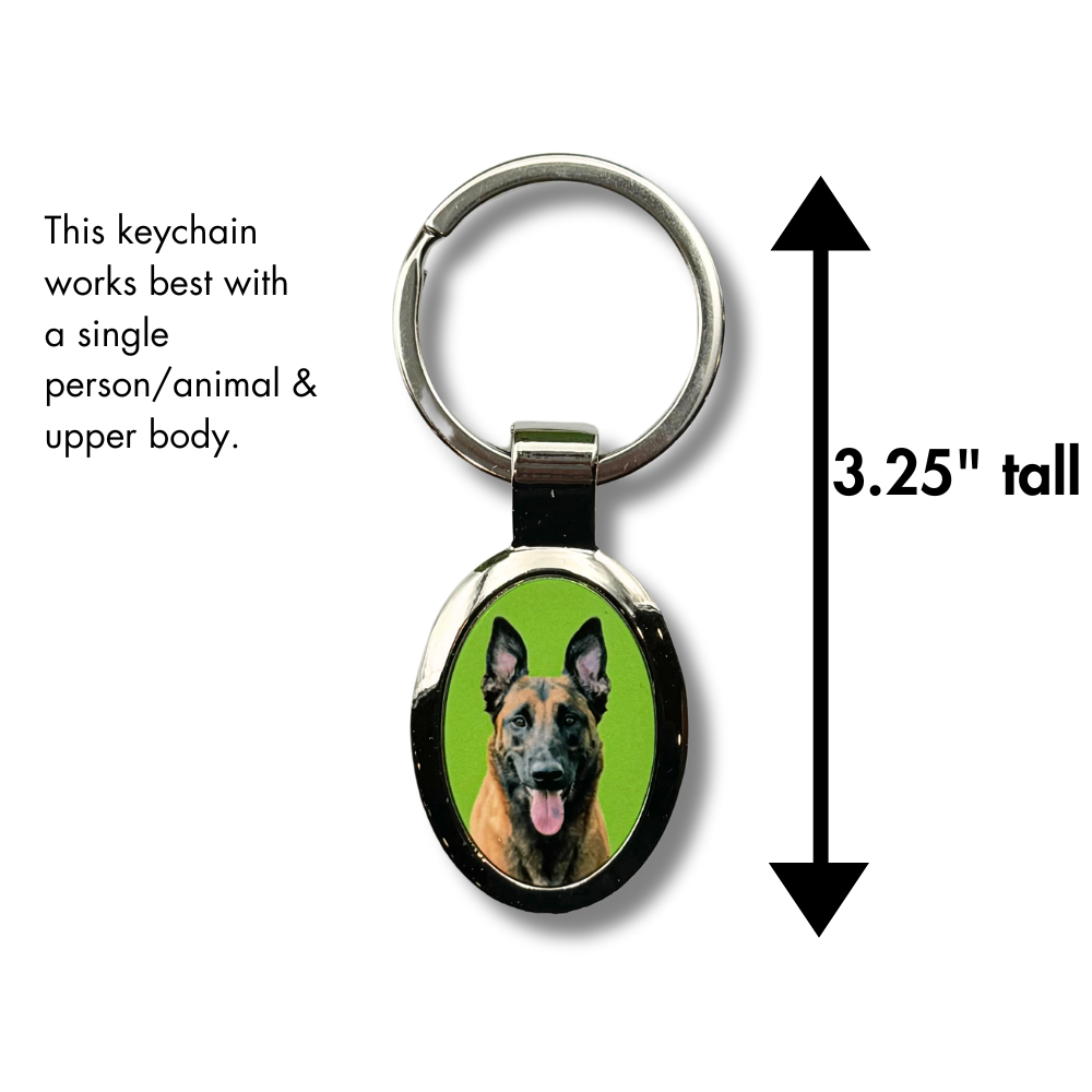 custom photo metal keychain for dog lover featuring an oval photo of a belgian malinois "maligator" with a green background. Arrow shows height is 3.2 of total keychain.