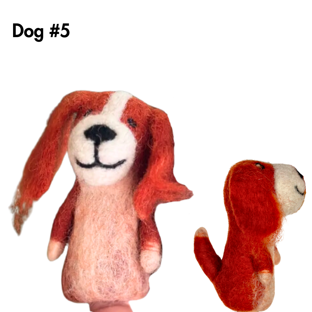 cute felt dog finger puppet shown from front and side. Looks like a reddish-brown and white king charles cavalier dog or maybe a setter or spaniel.