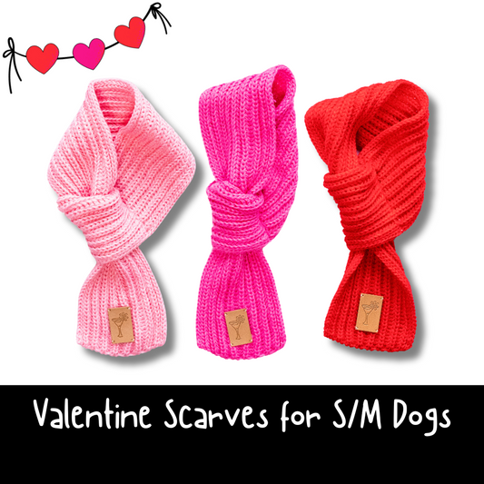 3 colors of dog scarves for valentine's day; light pink on left, dark pink in center and red on right.