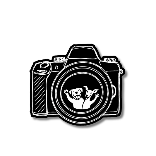 pet photographer sticker: black artsy drawing of camera with dogs inside camera lens