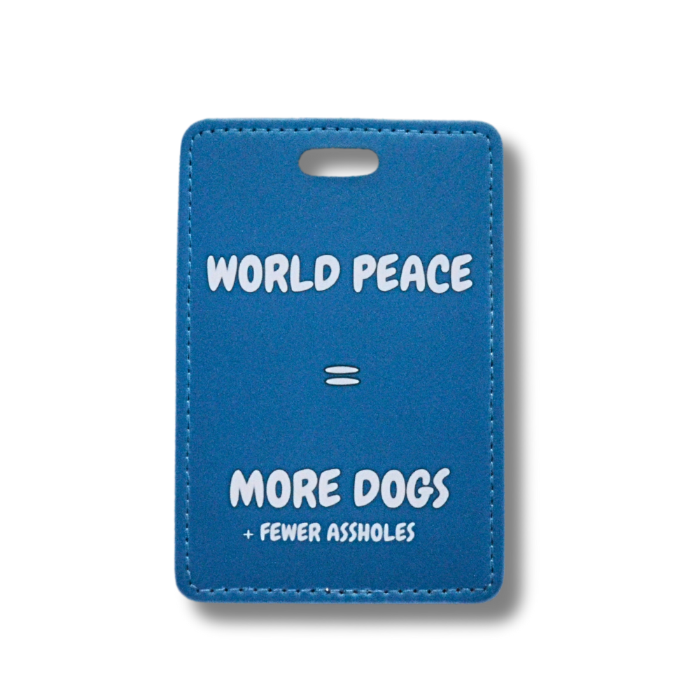 deep blue dog lover luggage tag with white text: world peace = more dogs + fewer assholes