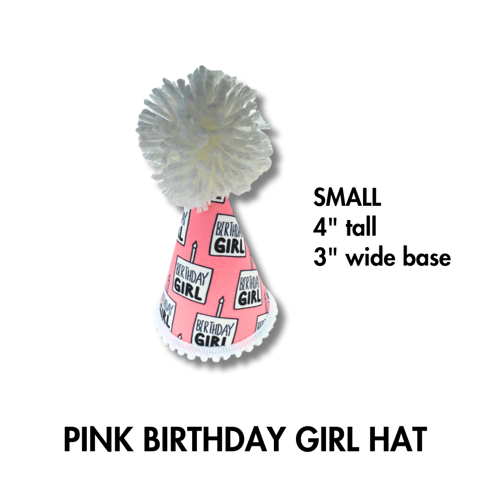 Size small info for: Cute fabric wrapped dog party hat. Pink and white fabric that says "birthday girl" in black font. Large white pom on top.