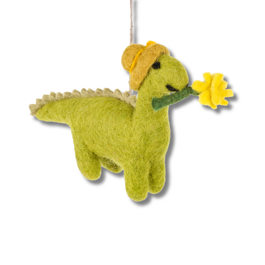 Cute green felt dinosaur ornament; green dino wearing a yellow hat The dino has a yellow flower in her mouth. 