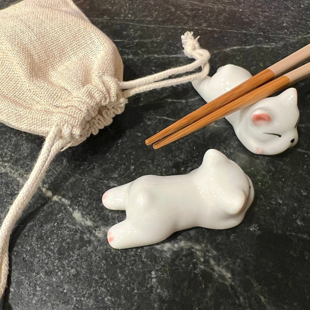 close up of Frenchie chopstick rests included in French bulldog gift basekt