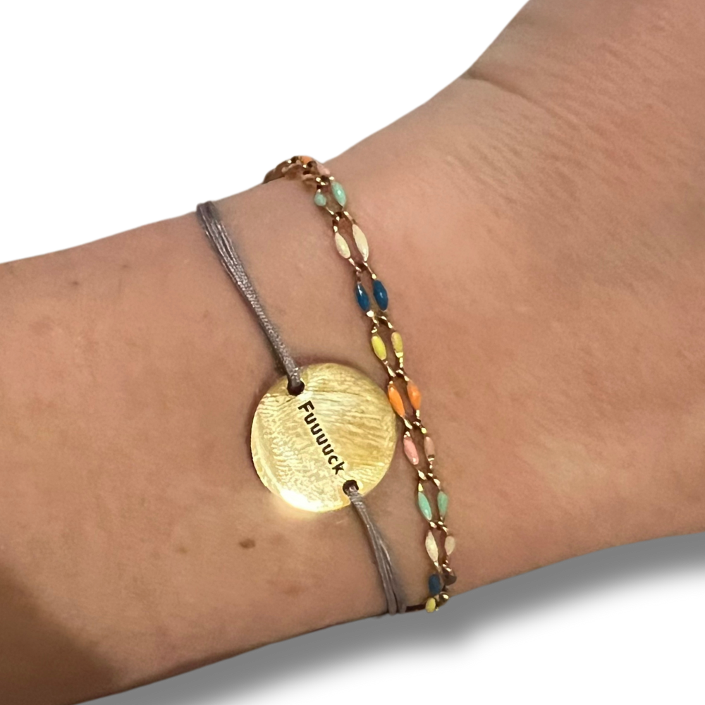 sweary funny friendship bracelet: gray waxed cotton with gold coin that says FUUUUCK