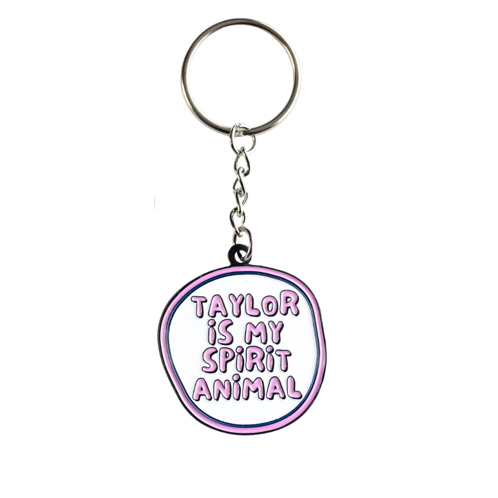 Pink and white enamel keychain, irregular circle shape "Taylor is my spirit animal"