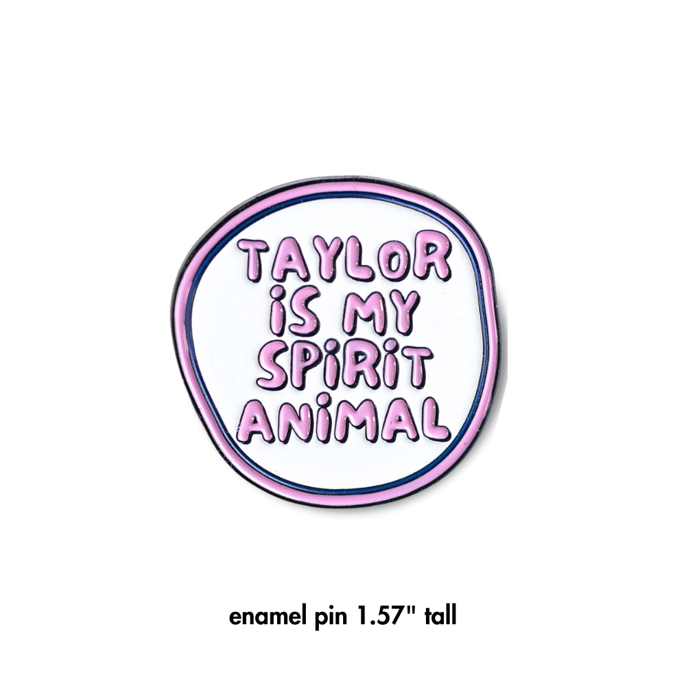 close up of Pink and white enamel pin, irregular circle shape "Taylor is my spirit animal"