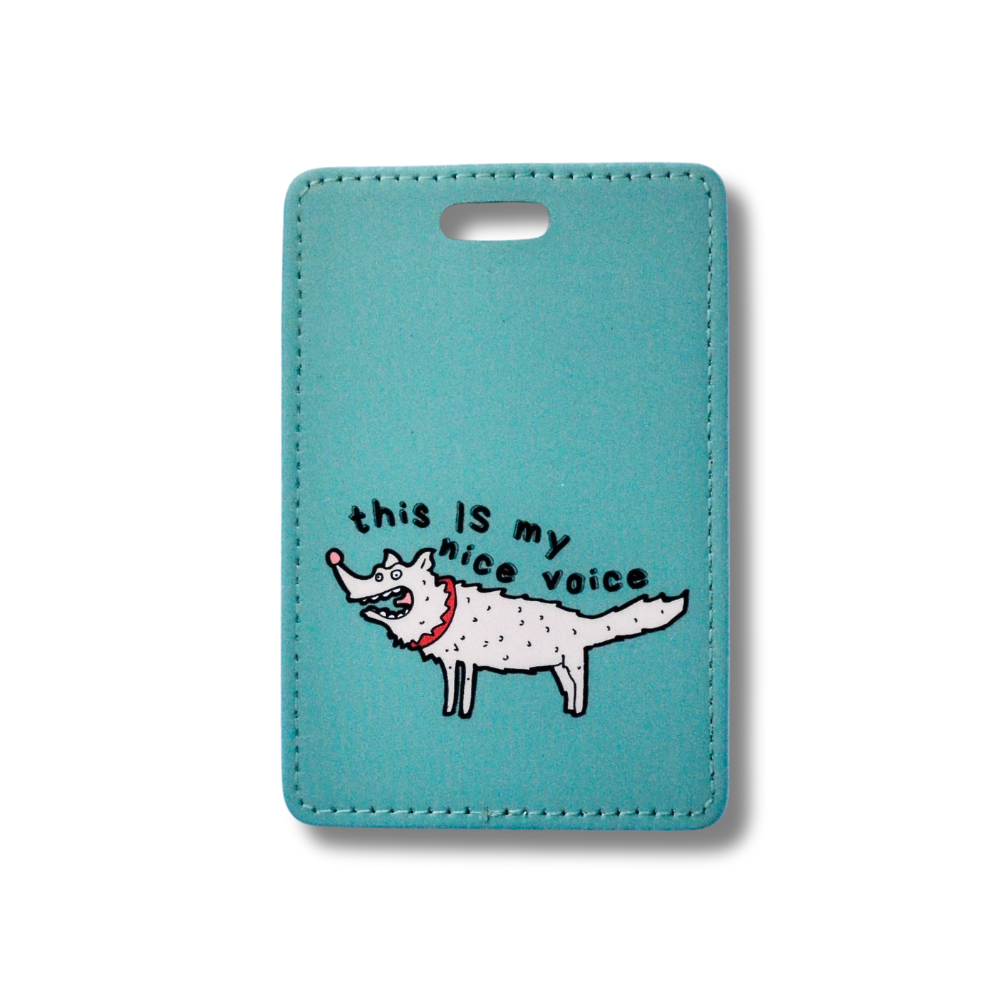 Teal luggage tag with snarling funny cartoon dog: this is my nice voice