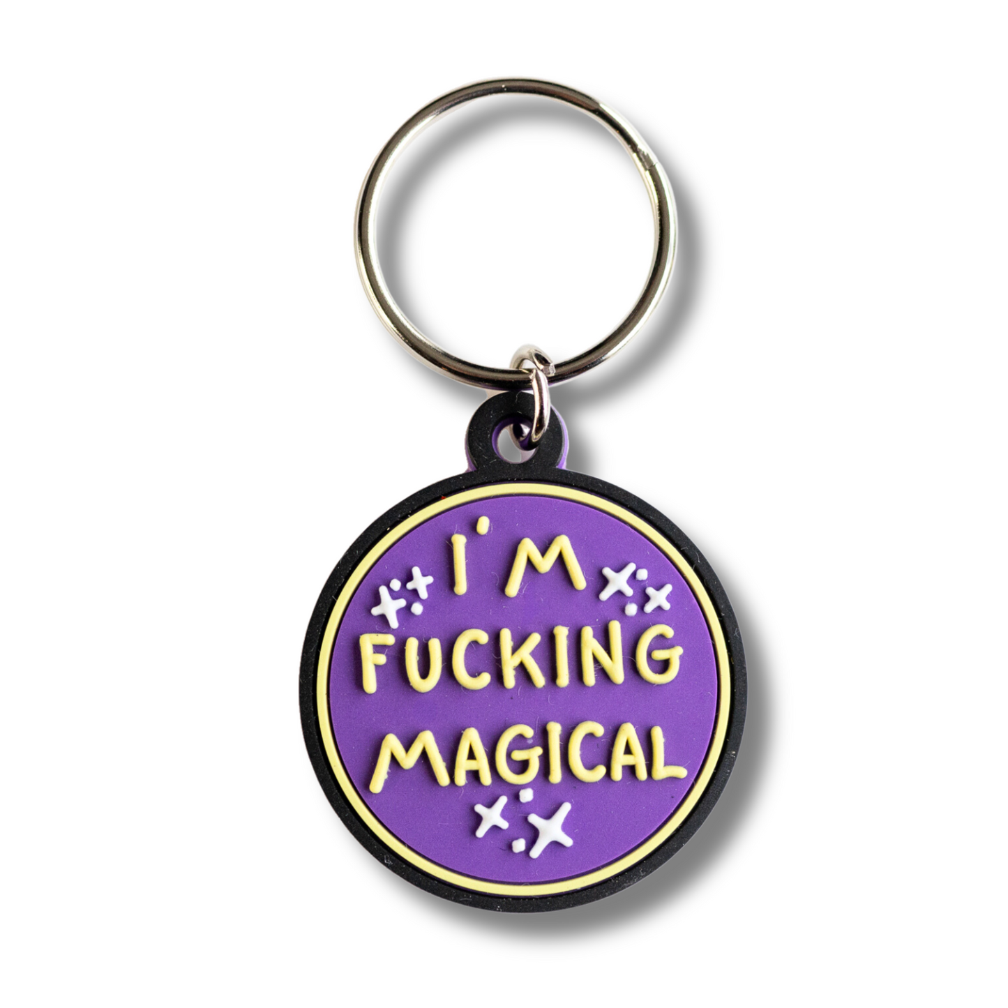 round purple and yellow trendy dog collar charm with 3-D raised letters "I'm f'ing magical"