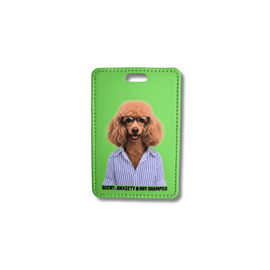 Funny poodle luggage tag with green background, glasses, button-down shirt, and text “Scent: Anxiety & Dry Shampoo.”