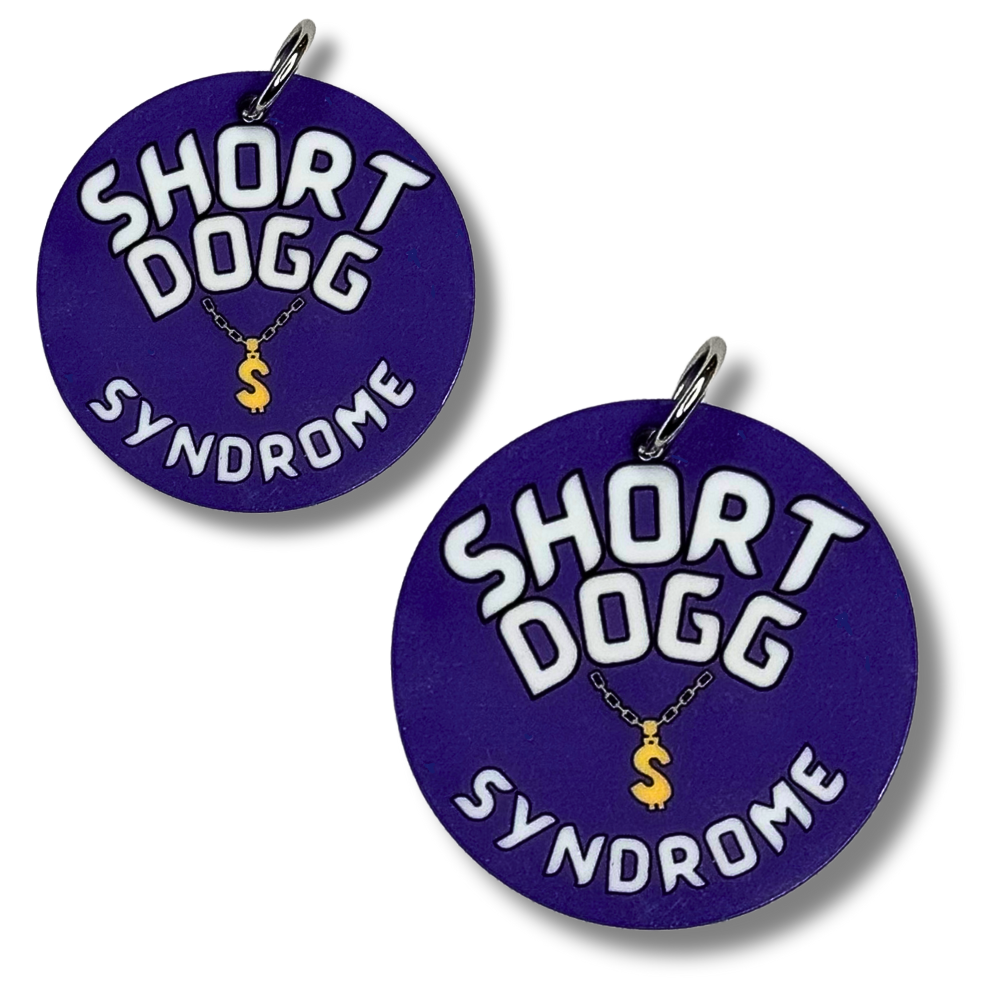 1.5" and 2" options shown of purple funny dog collar charm. It has image of a gold chain and says SHORT DOGG SYNDROME