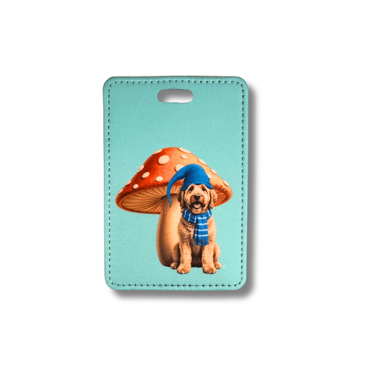 Goldendoodle uggage tag with a dog and mushroom design on a light blue background
