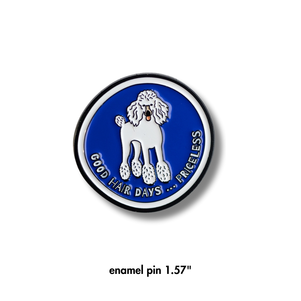 Blue round enamel poodle pinwith white poodle and white and black border.  Text: good hair days ... priceless. Full view of pin