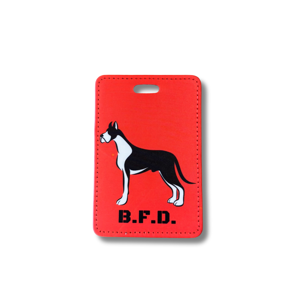 Red faux leather luggage tag featuring a black-and-white Great Dane and “B.F.D.” text. Stylish and durable for dog lovers who travel.