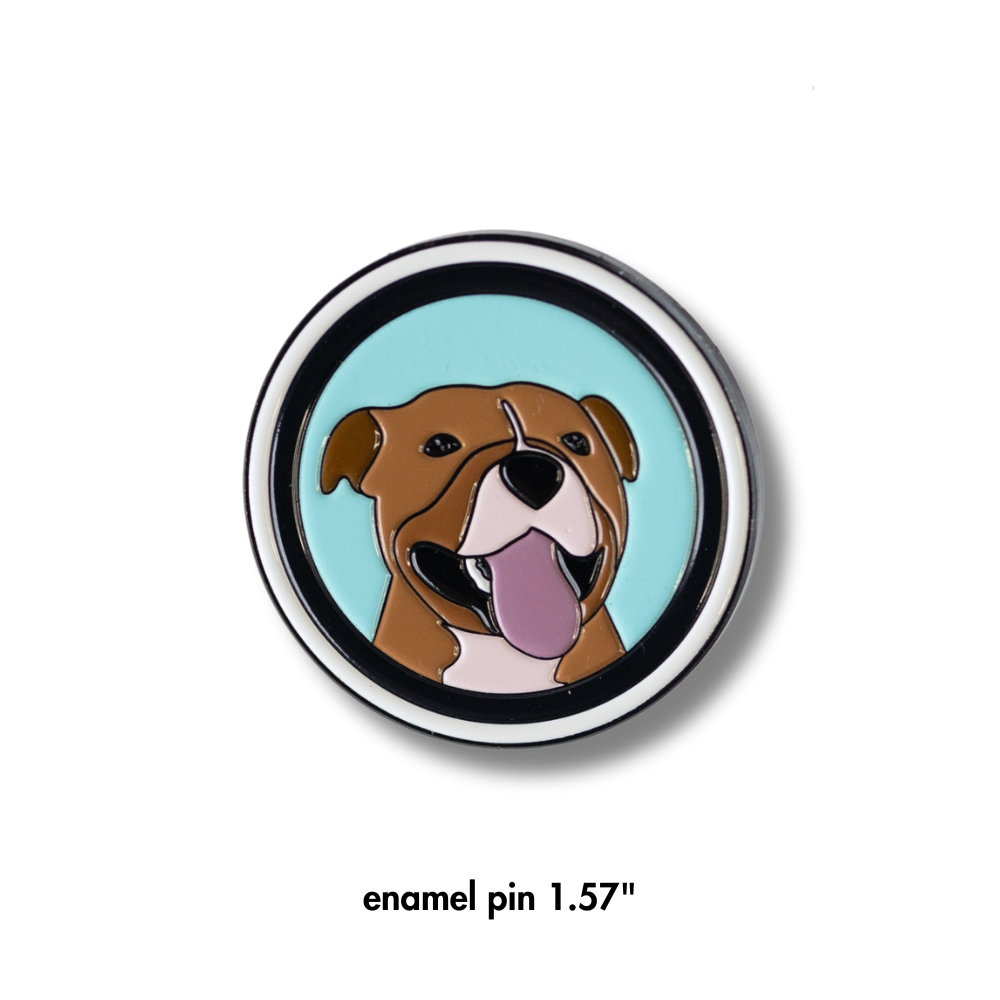 cute pit bull pin - circle, light blue background with white and black border, brown pit bull dog smiling