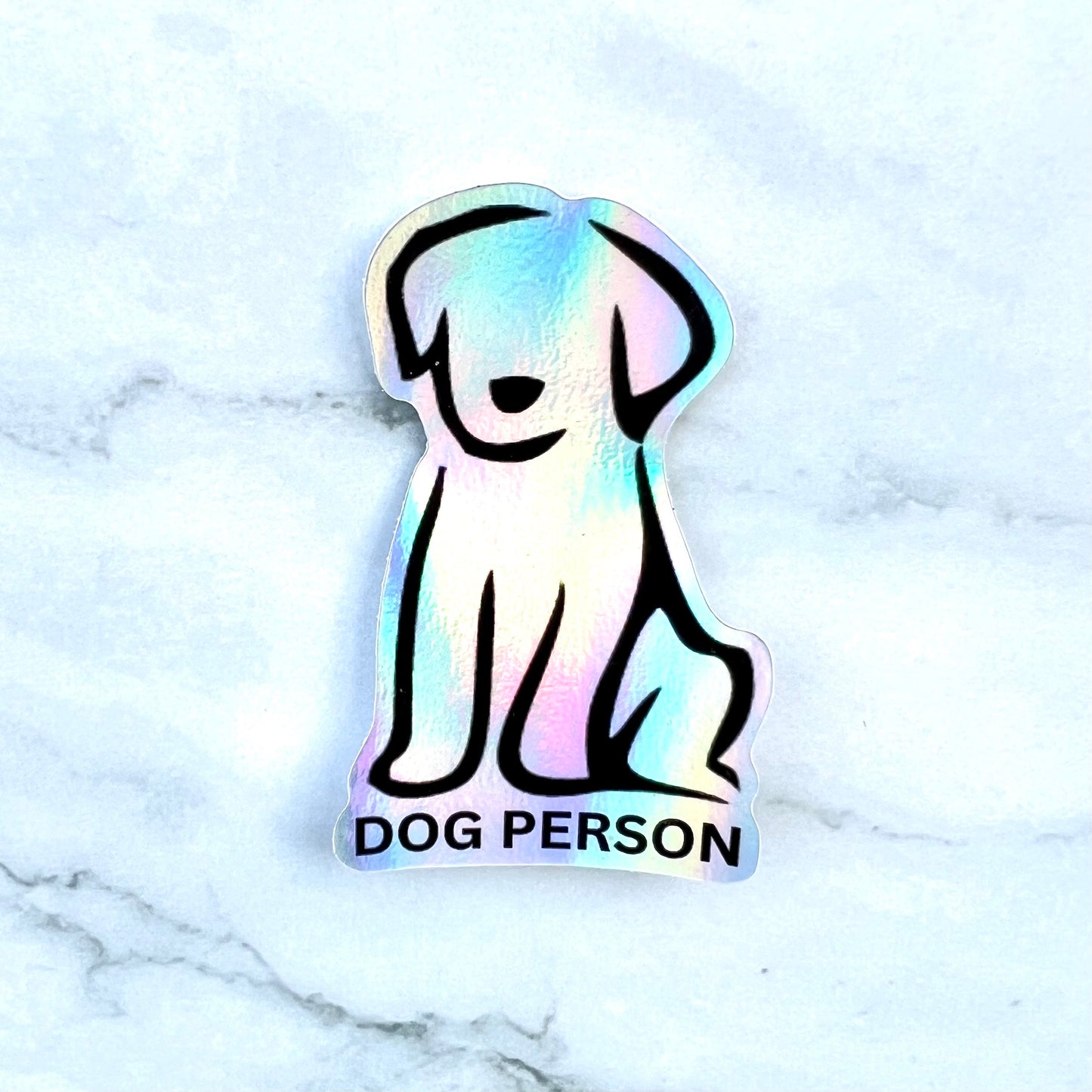 holographic sticker of a minimalist black line drawing of a dog, "DOG PERSON"