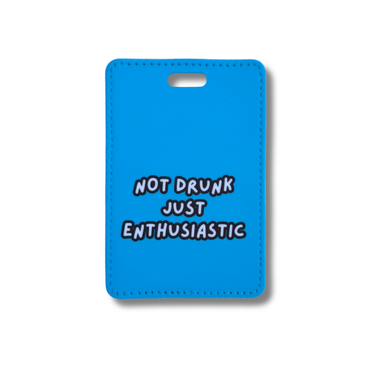 Funny blue faux leather luggage tag with "Not Drunk, Just Enthusiastic." A must-have travel accessory for those with a questionable grip on hydration.