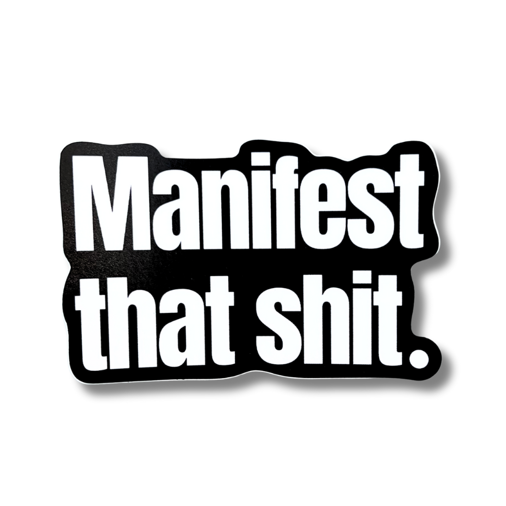 Large black sticker with bold font: Manifest That Shit