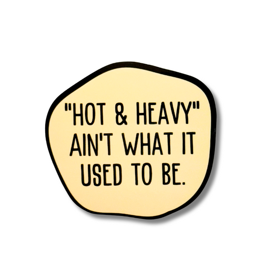 Irregular circle pale yellow menopause humor sticker: hot & heavy ain't what it used to be.