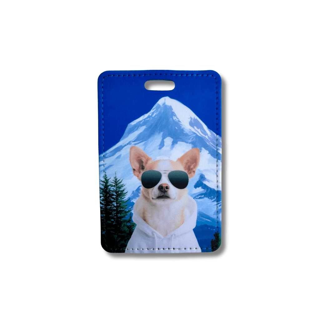 Chihuahua luggage tag with blue mountain background and chihuahua wearing sunglasses and a white hoodie.