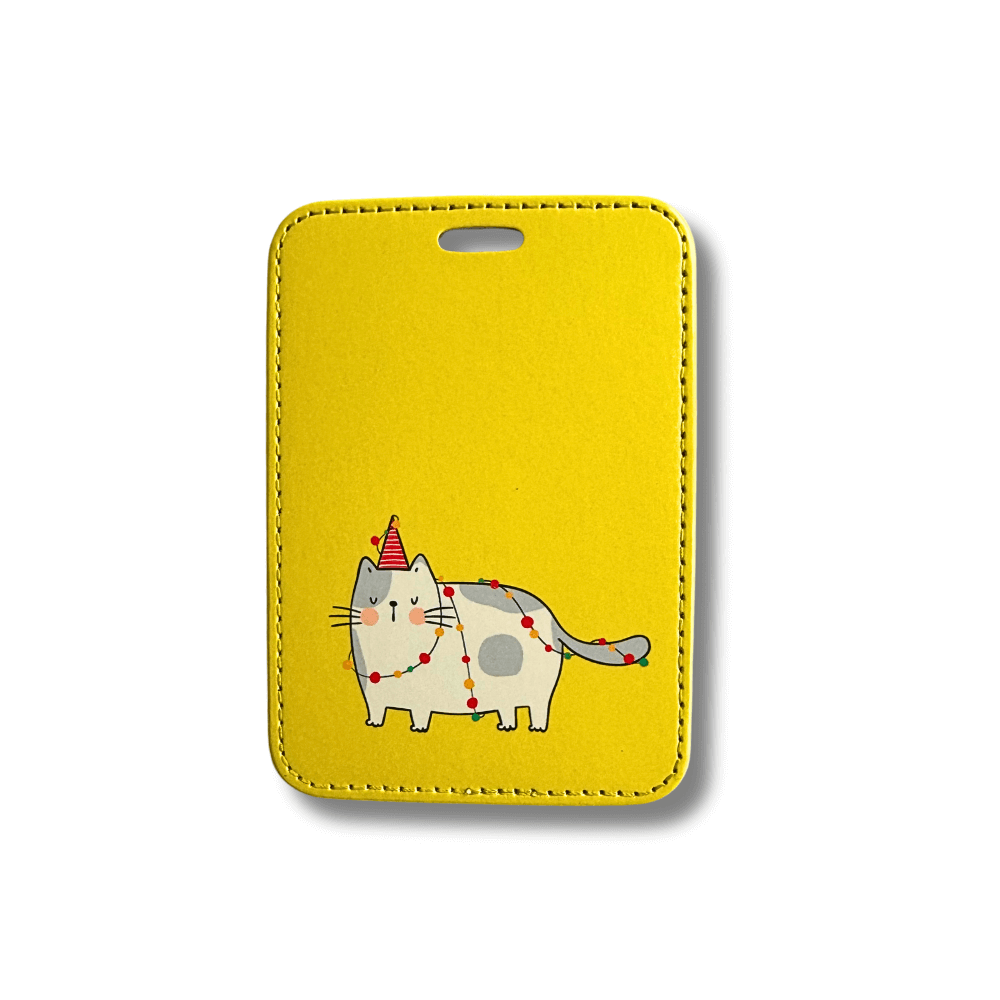 Yellow background with white party cat luggage tag. 